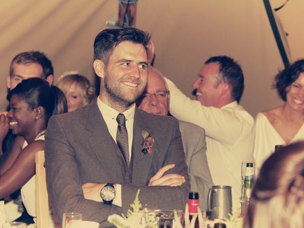 Groom smiling at wedding speech - Picture by Ian Shoots Weddings