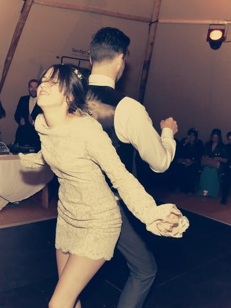 Bride and groom dancing back to back - Picture by Ian Shoots Weddings