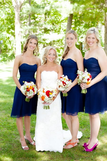 Bride with bridesmaids wearing blue dresses - Picture by Laura Ivanova Photography