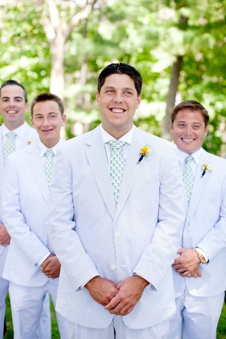 Groomsmen wearing pale blue striped suits - Picture by Laura Ivanova Photography