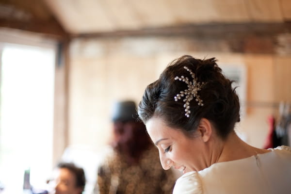 Bride wearing bridal hair piece - Picture by Levi Stolove Photography