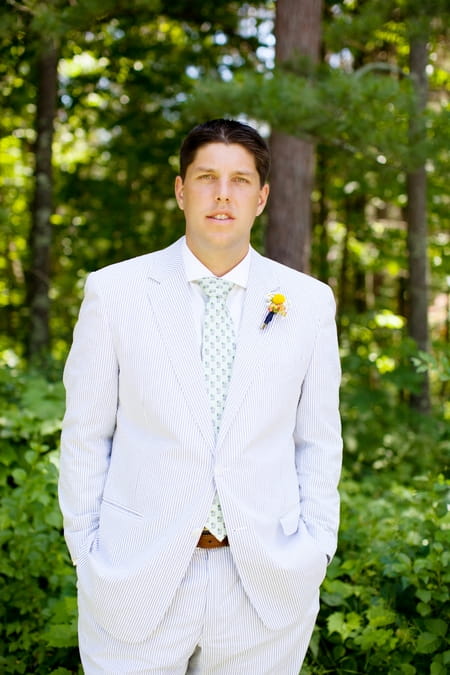 Groom wearing pale blue striped suit - Picture by Laura Ivanova Photography