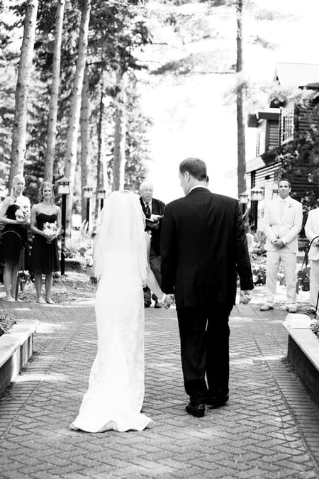 Father walking daughter down the aisle - Picture by Laura Ivanova Photography