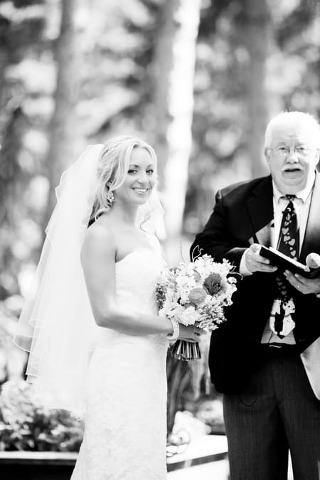 Brde smiling at wedding ceremony - Picture by Laura Ivanova Photography