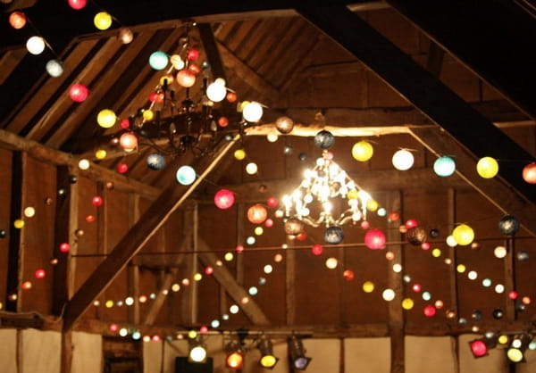 Lamp Strings Hung from Beams