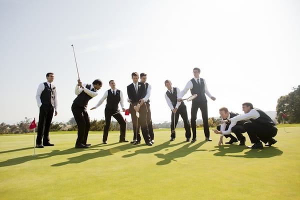 Groomsmen playing golf - Picture by Allyson Magda Photography