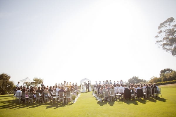 Outdoor wedding ceremony in California - Picture by Allyson Magda Photography