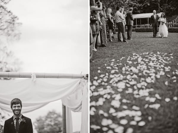 Bride walking down aisle with petals on grass - Picture by Jonas Peterson Photography