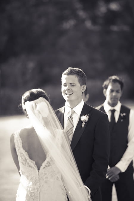 Bride and groom facing each other - Picture by Allyson Magda Photography