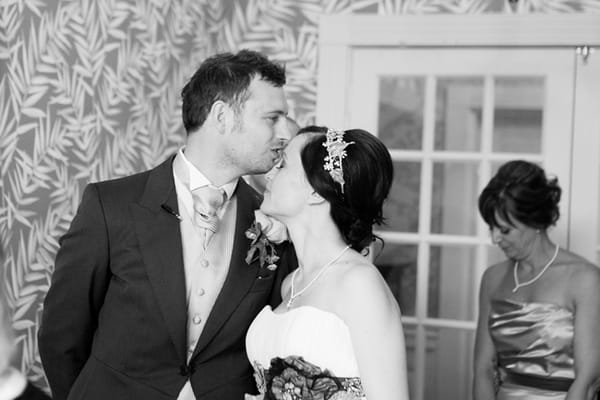 Groom kissing bride on forehead - Picture by Hayley Ruth Photography