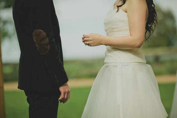 Bride holding wedding ring - Picture by Jonas Peterson Photography