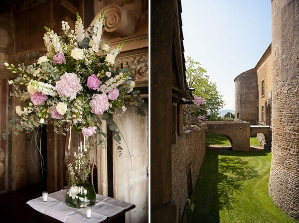 Wedding flowers in tall vase at French chateau - Picture by Gill Maheu Photography