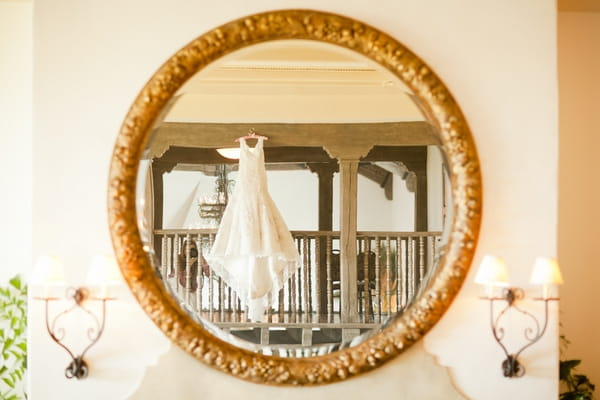 Wedding dress in mirror - Picture by Allyson Magda Photography