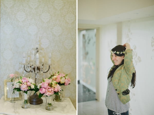 Wedding flowers and bride putting on headband - Picture by Jonas Peterson Photography