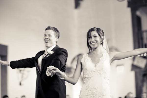 Bride and groom preparing for first dance - Picture by Allyson Magda Photography