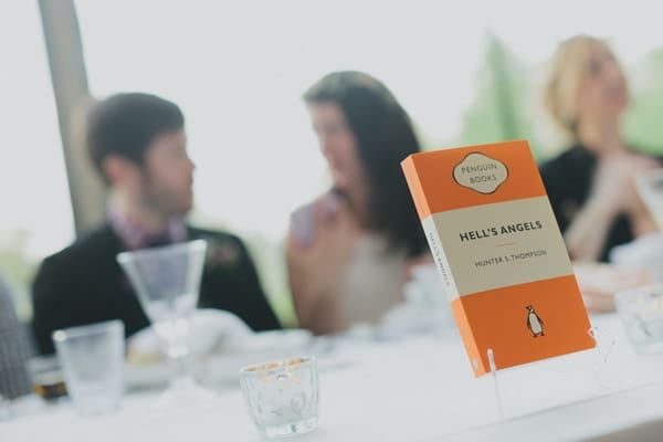 Hells angels book used as wedding table name - Picture by Jonas Peterson Photography