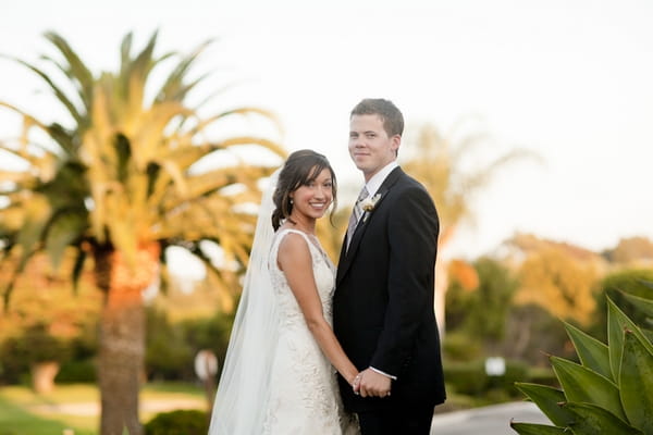 Bride and groom smiling - Picture by Allyson Magda Photography