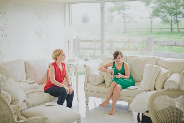 Two ladies waiting to get ready for wedding - Picture by Jonas Peterson Photography