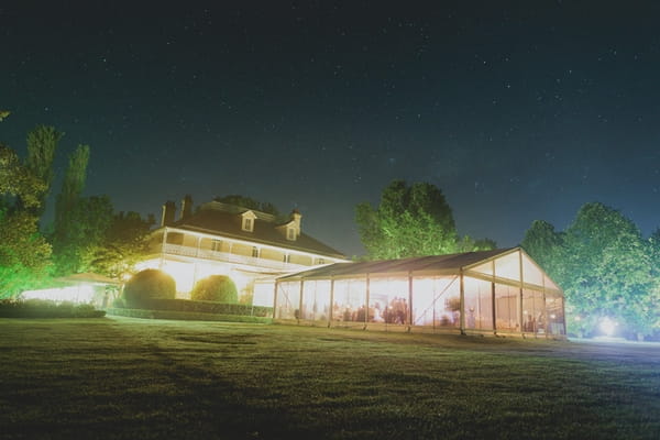 Wedding venue lit up at night - Picture by Jonas Peterson Photography