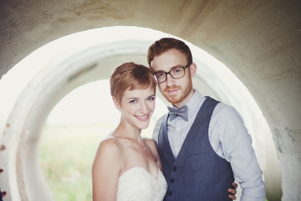 Bride and groom inside a concrete cylinder - Picture by Josh Dookhie Photography