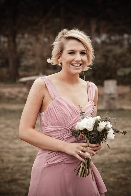 Bridesmaid in pink dress - Picture by Archibald Photography