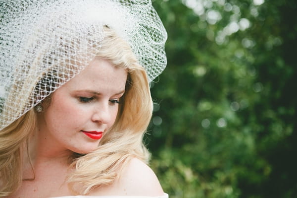 Bride wearing veil and red lipstick - Picture by McKinley-Rodgers Photography