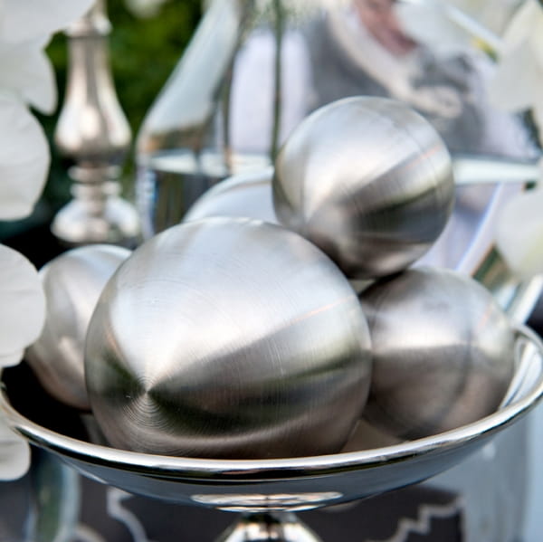 Large silver ball decorations - Picture by Yvette Roman Photography