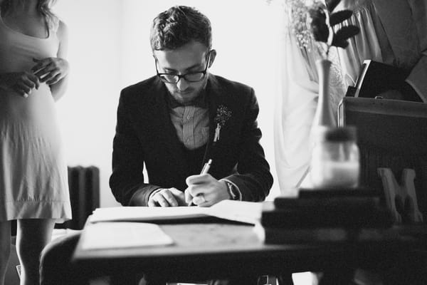 Signing the register - Picture by Josh Dookhie Photography