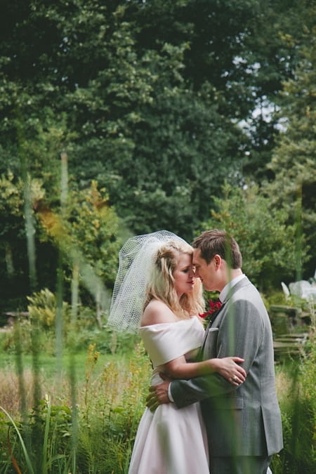 Bride and groom touching noses - Picture by McKinley-Rodgers Photography