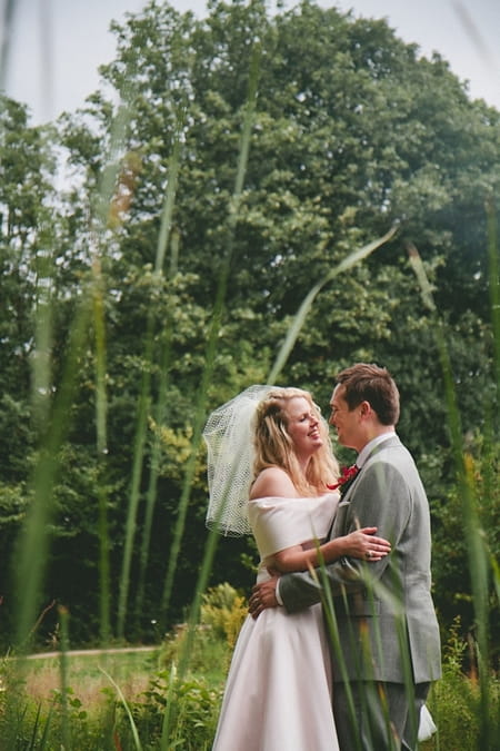 Bride and groom smiling at each other - Picture by McKinley-Rodgers Photography