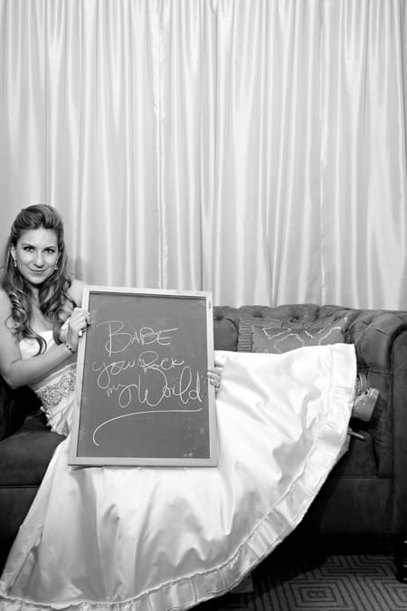 Bride with chalk board message - Picture by Yvette Roman Photography