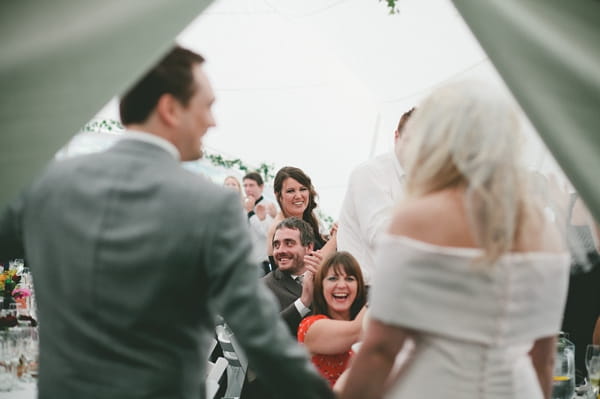 Bride and groom entering wedding reception - Picture by McKinley-Rodgers Photography