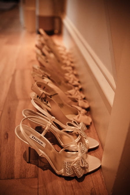 Row of wedding shoes - Picture by Archibald Photography