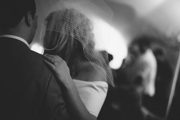 Bride's hand on groom's shoulder - Picture by McKinley-Rodgers Photography