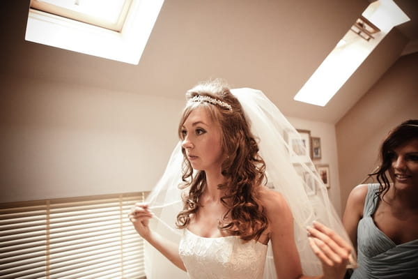 Bride checking her veil - Picture by Archibald Photography