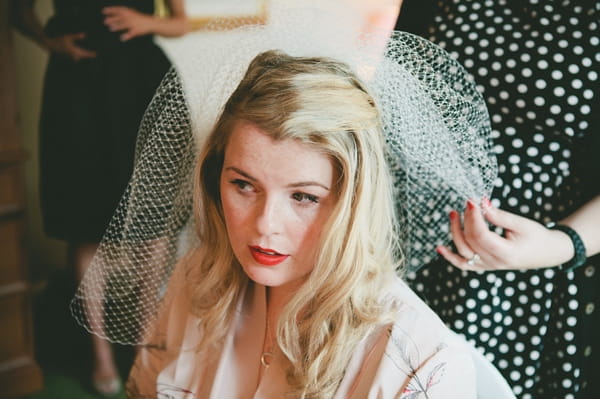 Bride trying on veil - Picture by McKinley-Rodgers Photography