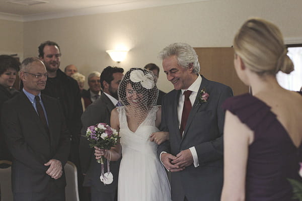 Bride walking into wedding ceremony with father - Picture by York Place Studios