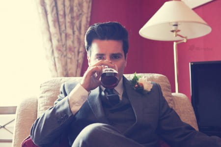 Vintage groom drinking Jack Daniel's and Coke - Picture by Mirrorbox Photography
