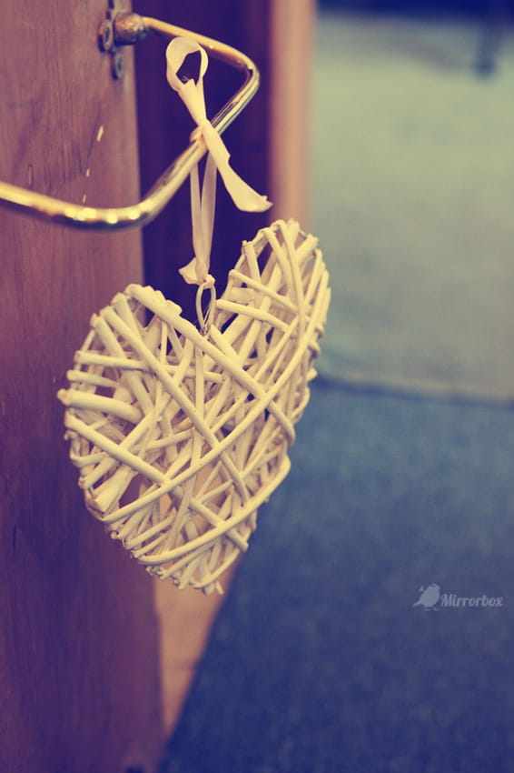 Wicker heart hanging from door handle - Picture by Mirrorbox Photography