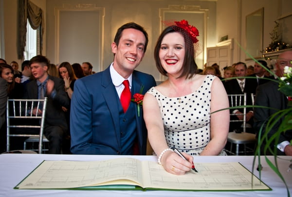 Bride signing the register - Picture by Anneli Marinovich Photography