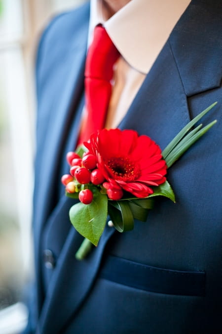 Bright red buttonhole - Picture by Anneli Marinovich Photography