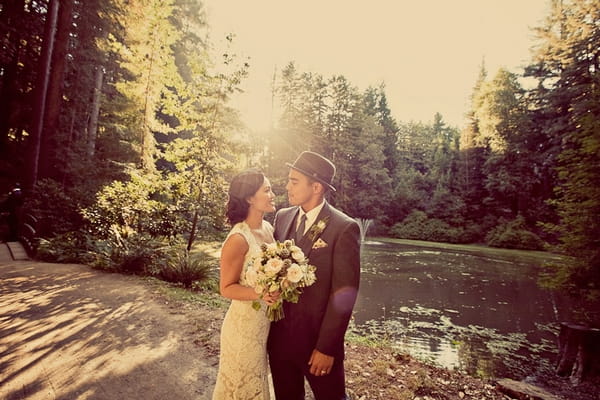 Vintage bride and groom by lake - Picture by Paco and Betty