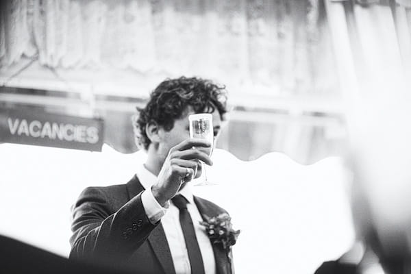 Groom raising a toast - Picture by York Place Studios