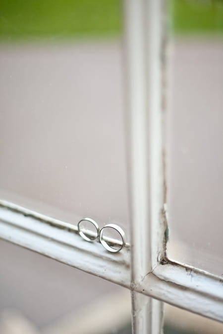 Wedding rings on window frame - Picture by Anneli Marinovich Photography