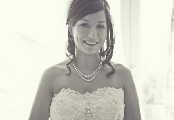 Bride smiling - Picture by Mirrorbox Photography