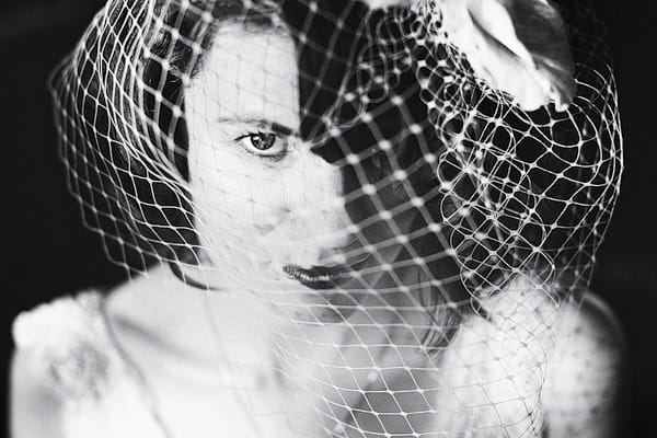 Black and white picture of bride wearing veil - Picture by York Place Studios