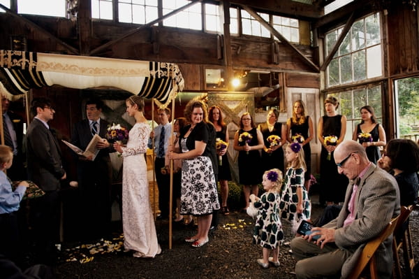 Wedding ceremony in barn - Picture by Judy Pak Photography