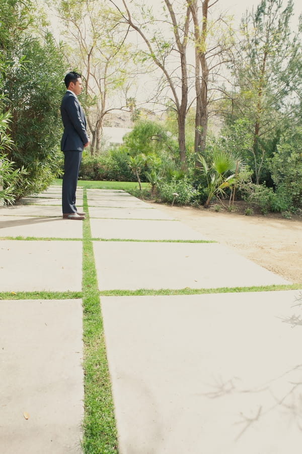 Groom standing waiting - Picture by onelove photography