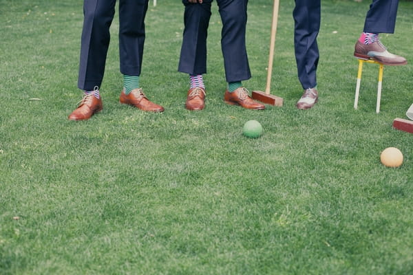 Legs of men playing croquet - Picture by onelove photography