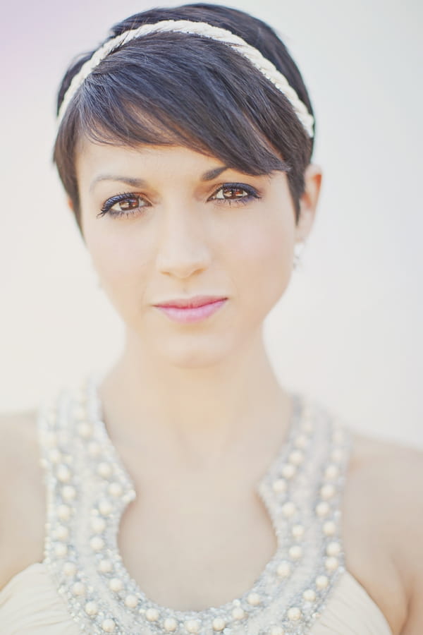 Pretty bride with head band - Picture by Our Labor of Love Photography